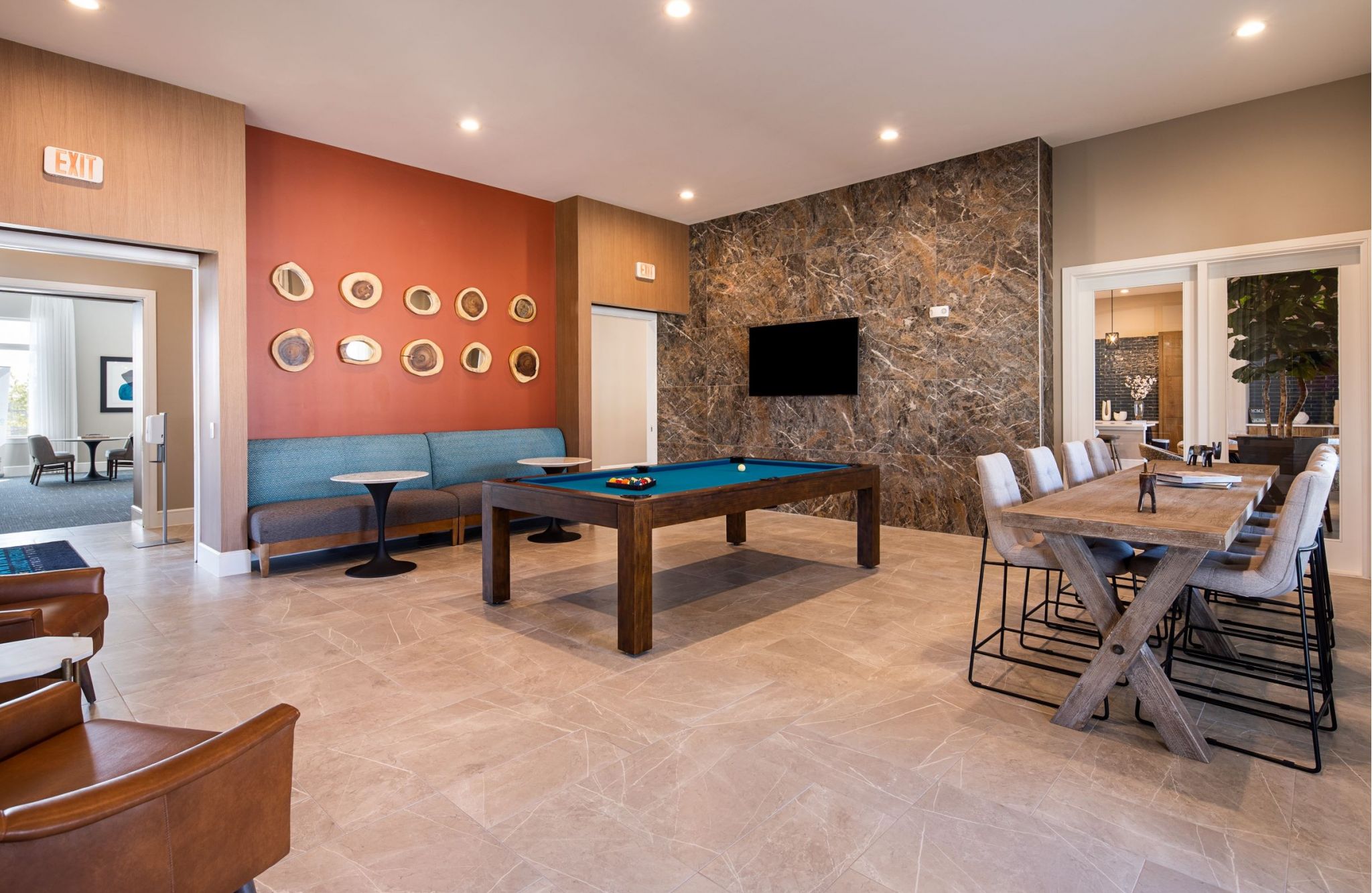 Hawthorne at Blanco Riverwalk sresident clubhouse amenity with seating area, pool table, and beautiful finishes